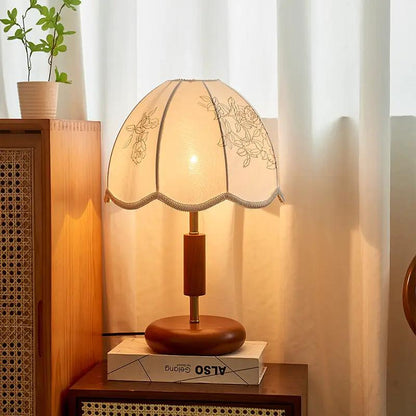 French retro oak solid wood table lamp with floral embroidered fabric shade on a table on Tampa Home & Garden Store