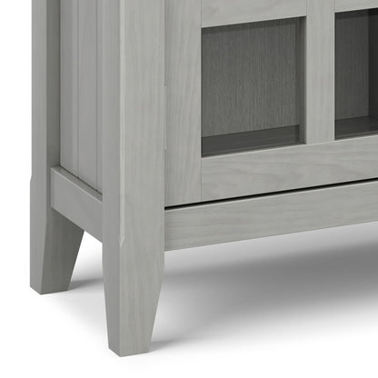 Acadian Entryway Storage Cabinet in gray wash with glass doors and tapered legs for Tampa on Tampa Home & Garden Store