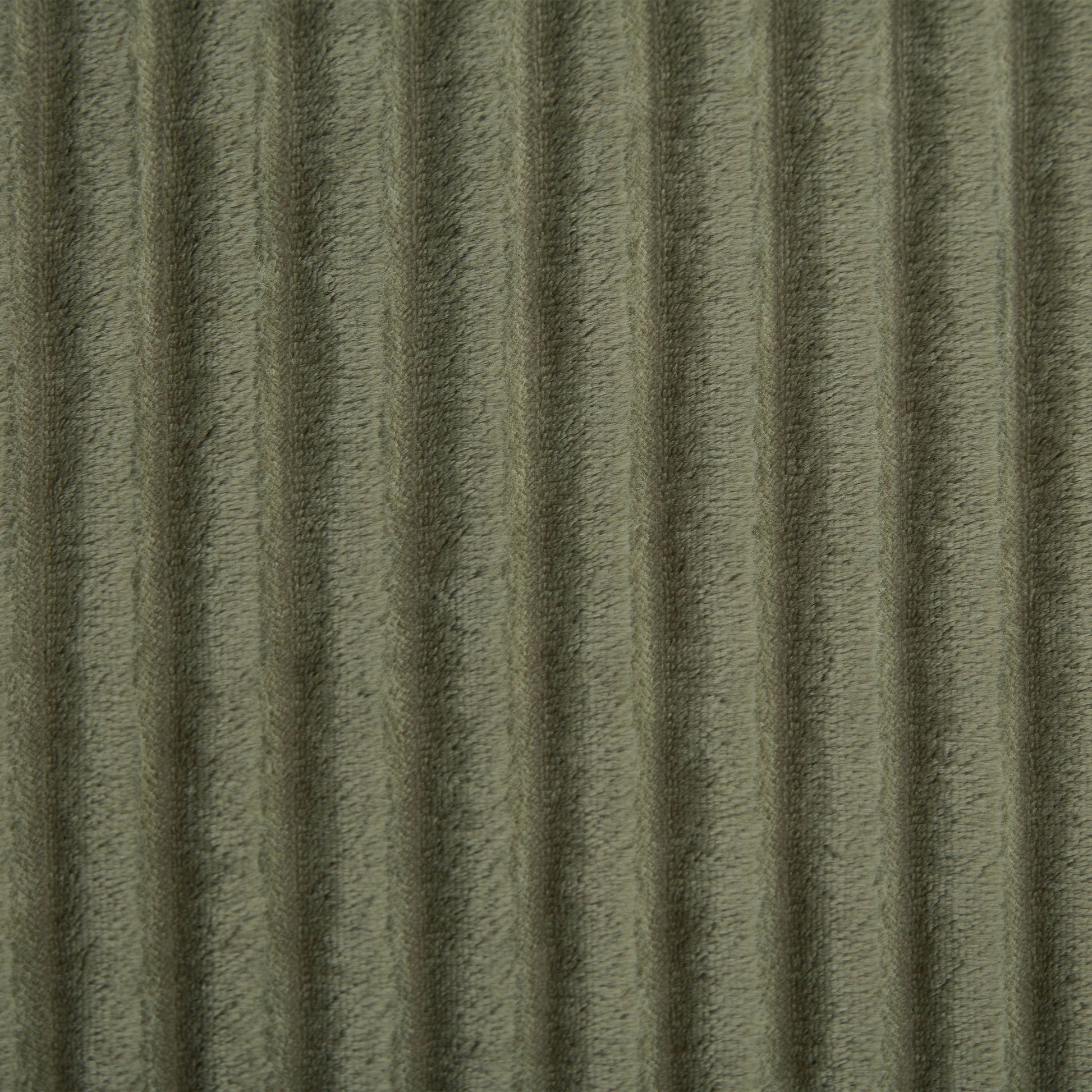 Modern chaise upholstery fabric in olive green velvet with textured folds on Tampa Home & Garden Store