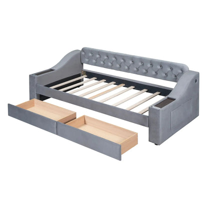 Upholstered daybed with tufted grey headboard and built-in storage drawers on Tampa Home & Garden Store