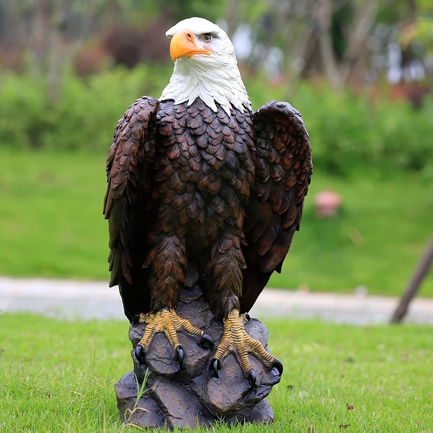 Large standing bald eagle garden statue by HouseOfZazla, white head, brown body, perched on rock on Tampa Home & Garden Store