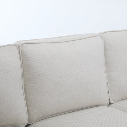 Beige textured fabric sofa with rolled arm design and visible seam details on Tampa Home & Garden Store