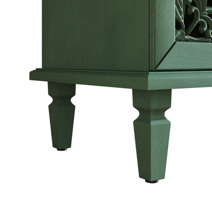 Antique green buffet cabinet with floral carvings and turned legs on Tampa Home & Garden Store