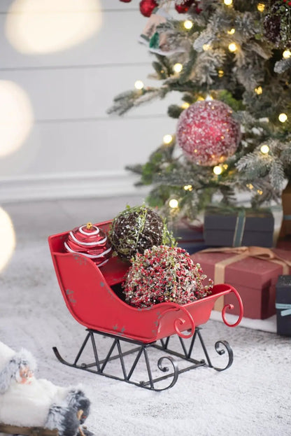 Iron Sleigh distressed red Christmas Santa sleigh holiday decoration with metal runners on Tampa Home & Garden Store