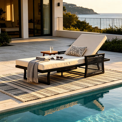 Black Iron Chaise Lounge And A Cream Cushion Set