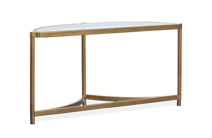 Cassidy demilune sofa table in aged brass with a glass top and slender cylindrical legs on Tampa Home & Garden Store