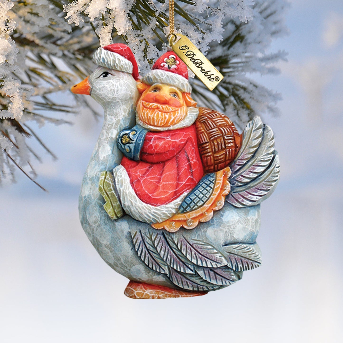 Santa on Goose Sculpted Ornament by G. DeBrekht, red Santa with blue-gray goose hanging tag on Tampa Home & Garden Store
