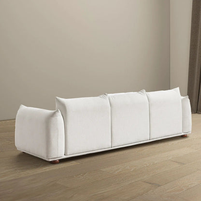Kely Upholstered Sofa by Unique Piece Furniture in white fabric with wooden feet on Tampa Home & Garden Store