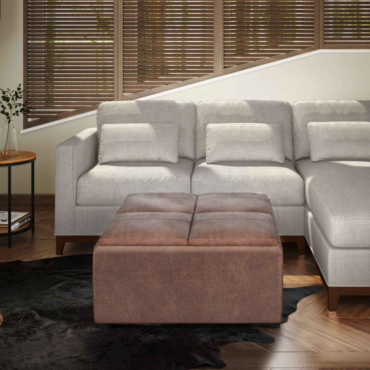 Avalon square ottoman coffee table in brown leather-like upholstery with storage trays on Tampa Home & Garden Store