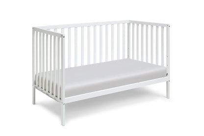 Palmer 3-in-1 Convertible Island Crib by Unique Piece Furniture in white with slatted sides on Tampa Home & Garden Store