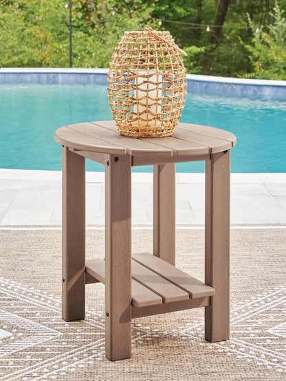 Grover Beach Oval Table coffee table in brown wood with woven wicker lantern on Tampa Home & Garden Store