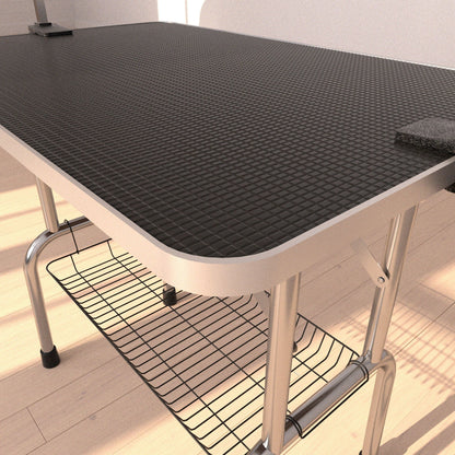 Professional dog grooming table with black textured top, metal frame, under-table mesh shelf on Tampa Home & Garden Store