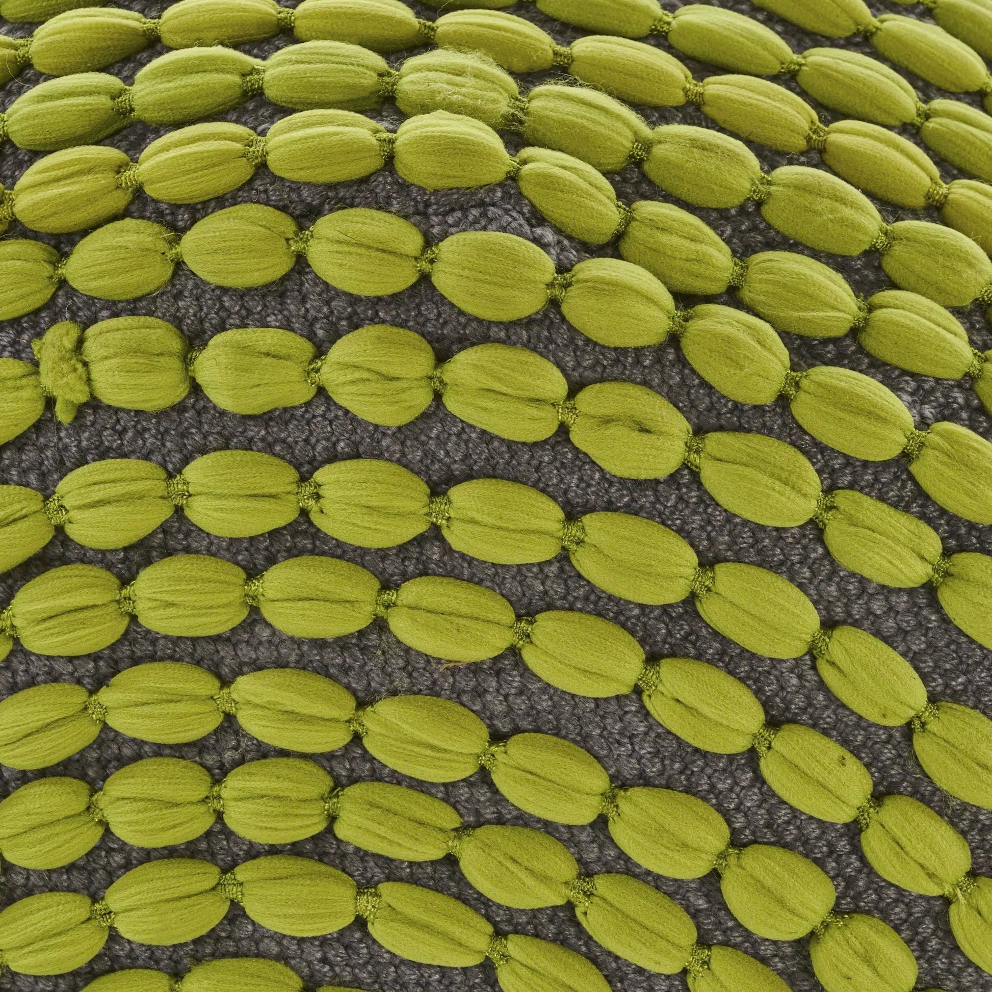 River cylindrical pouf in lime green water-resistant fabric with textured looped surface on Tampa Home & Garden Store