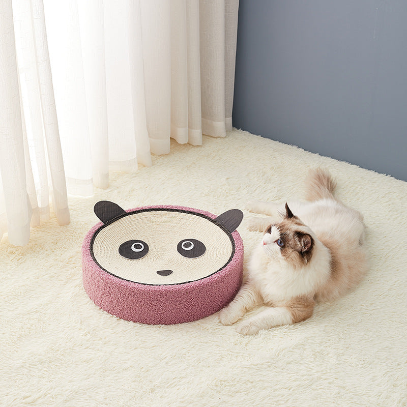 Round panda-face cat scratcher bed with pink corrugated sides, cat lounging beside it on Tampa Home & Garden Store