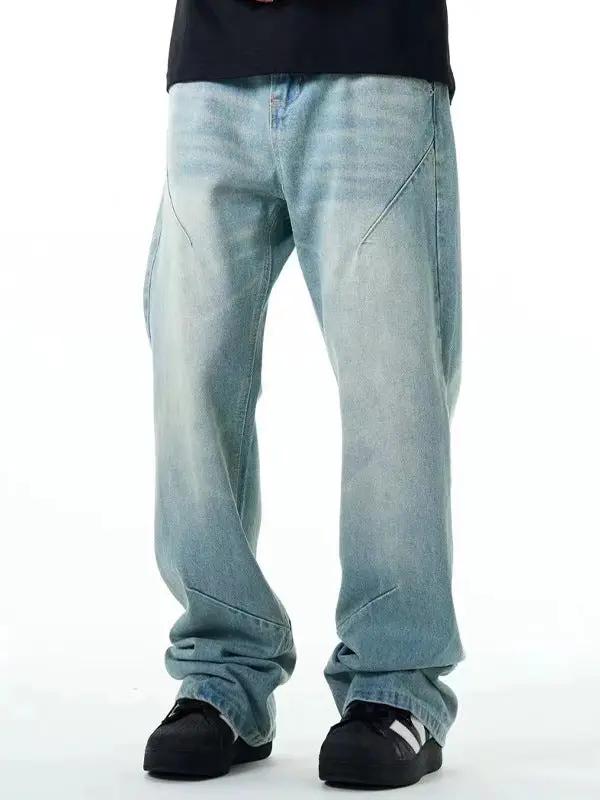 Washed distressed jeans, light blue denim, straight loose fit with faded panels on Tampa Home & Garden Store