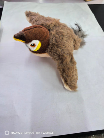 Pet plush winged bird toy, brown fluffy body with yellow beak and orange eye ring on Tampa Home & Garden Store