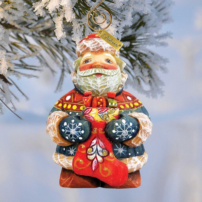 Stacking Surprise Santa figurine ornament by G. DeBrekht, holding blue snowflake ornaments on Tampa Home & Garden Store