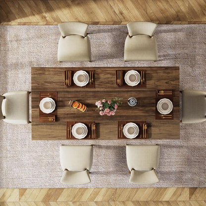 Dining table for 4-6 with a thick dark walnut wood top and beige upholstered chairs on Tampa Home & Garden Store