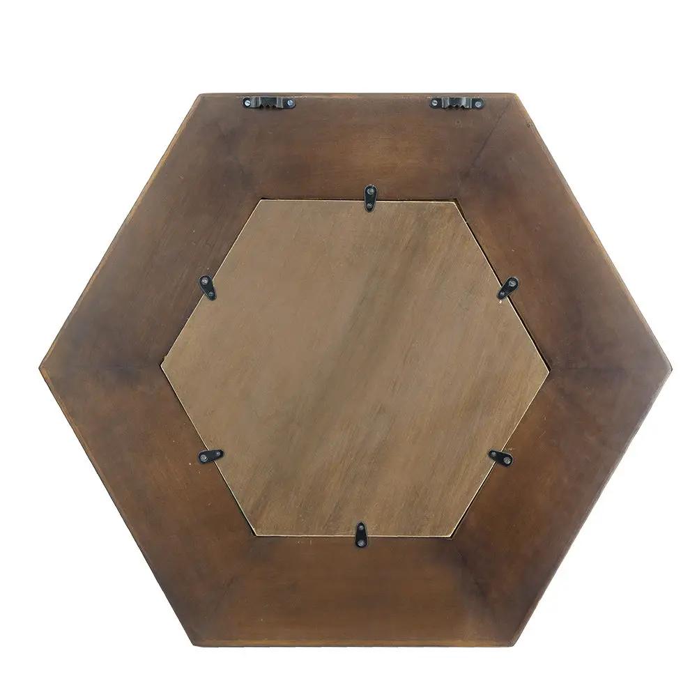 Hexagon mirror with natural wood frame; back view showing mounting clips for wall display on Tampa Home & Garden Store