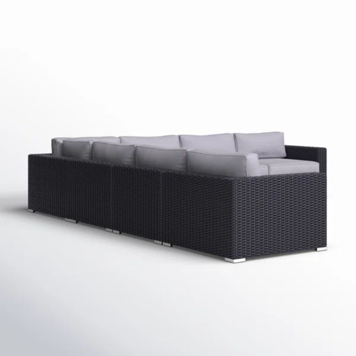 Luxurious wicker patio sectional with dark woven frame and light gray Sunbrella cushions on Tampa Home & Garden Store