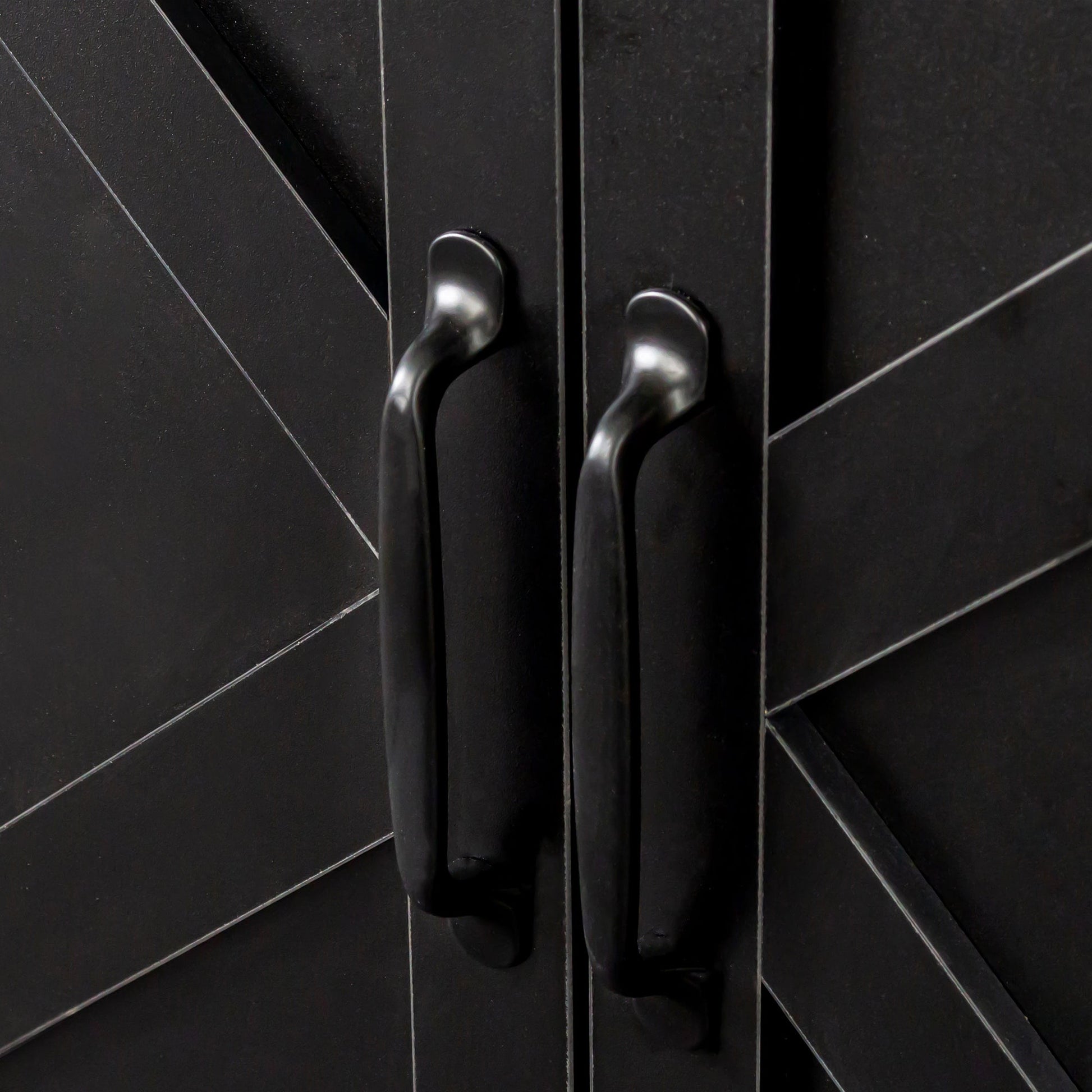 Cabinet with four doors in black and silver curved handles on Tampa Home & Garden Store