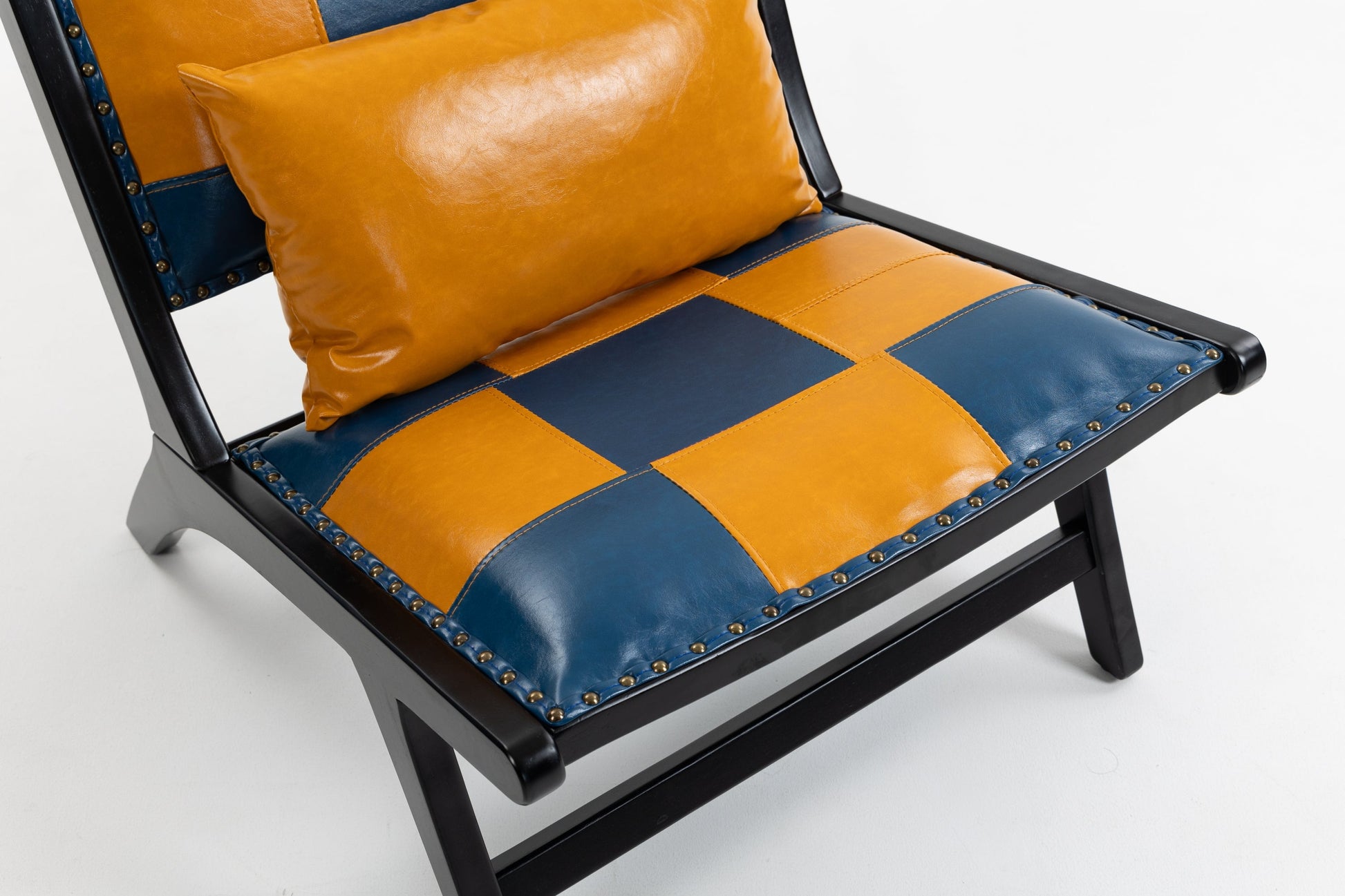 Modern Boho Accent Chair with orange and blue patchwork leather, nailhead trim, black frame on Tampa Home & Garden Store