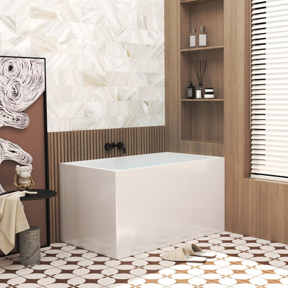 Modern Glossy White Freestanding Acrylic Bathtub HouseOfZazla in a bathroom with black faucet on Tampa Home & Garden Store