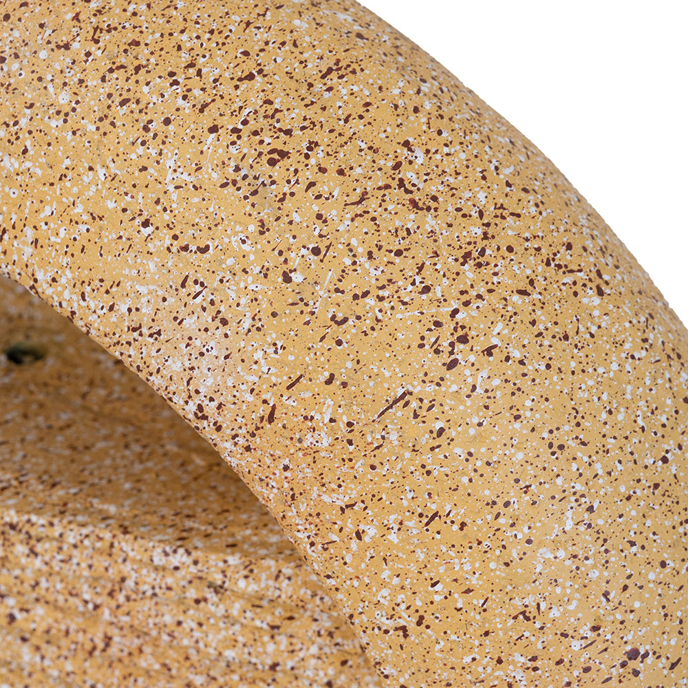 Cement round water fountain surface in yellow speckled finish with white and brown flecks on Tampa Home & Garden Store