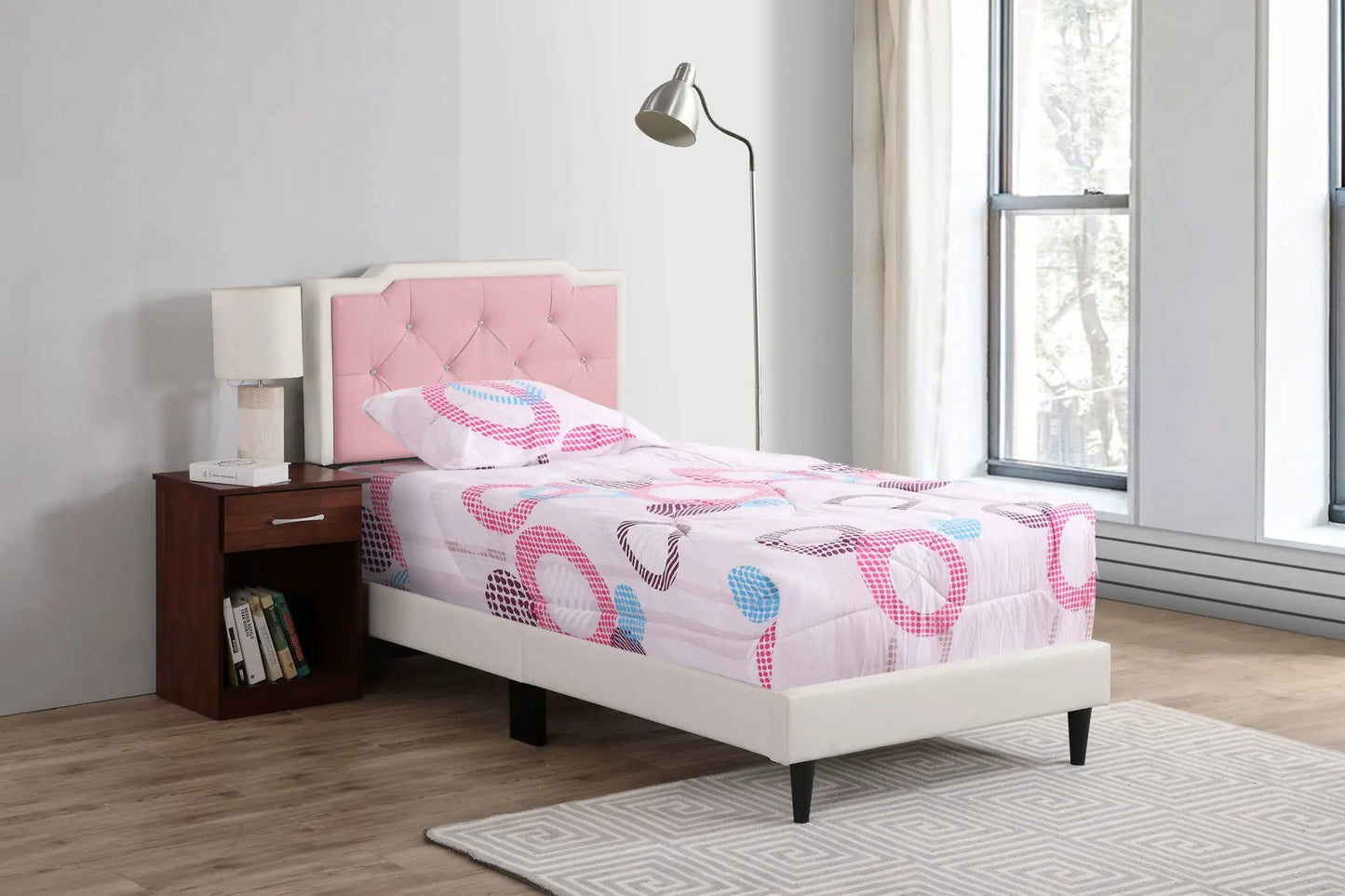 Button tufted upholstered bed with pink headboard and white frame, colorful bedding on Tampa Home & Garden Store