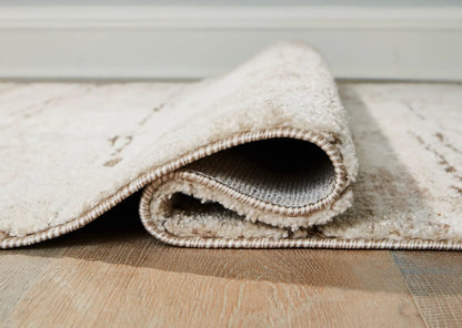 Kasney Rug beige plush area rug with cream shag pile and rolled edge on Tampa Home & Garden Store