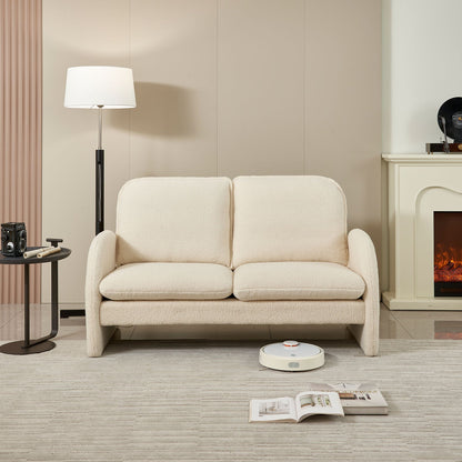 Loveseat sofa in cream Sherpa fabric with twin plush cushions in a cozy living room on Tampa Home & Garden Store