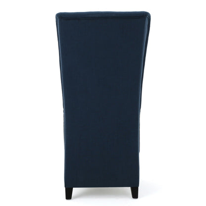 Upholstered dining chair with high back in navy blue fabric and birch wood legs on Tampa Home & Garden Store