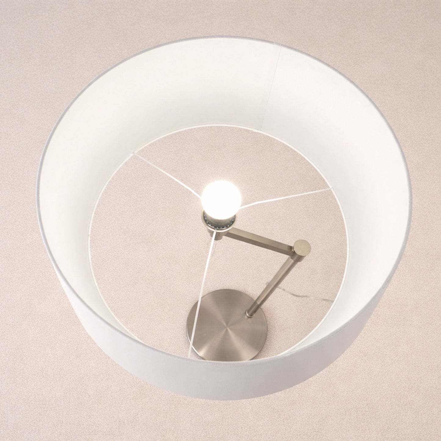 Horizon table lamp by HouseOfZazla with curved brushed nickel base and white linen shade on Tampa Home & Garden Store
