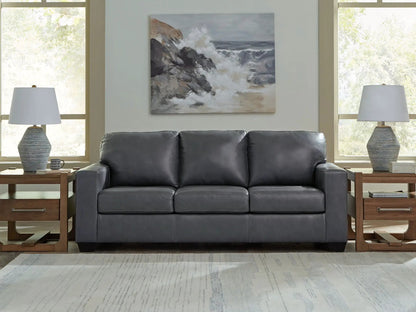Bolsena stationary sofa in dark gray leather with two light wood end tables on Tampa Home & Garden Store