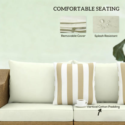 Rattan wicker patio couch with cream cushions and two beige striped throw pillows HouseOfZazla on Tampa Home & Garden Store