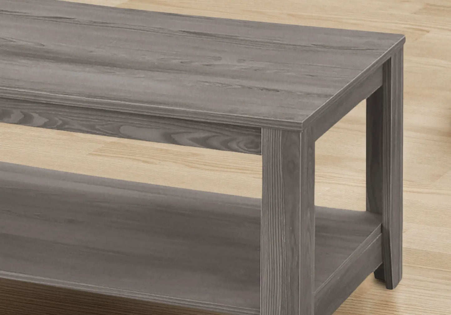 Gray wood coffee table with lower shelf and thick legs, part of a 3-piece table set on Tampa Home & Garden Store