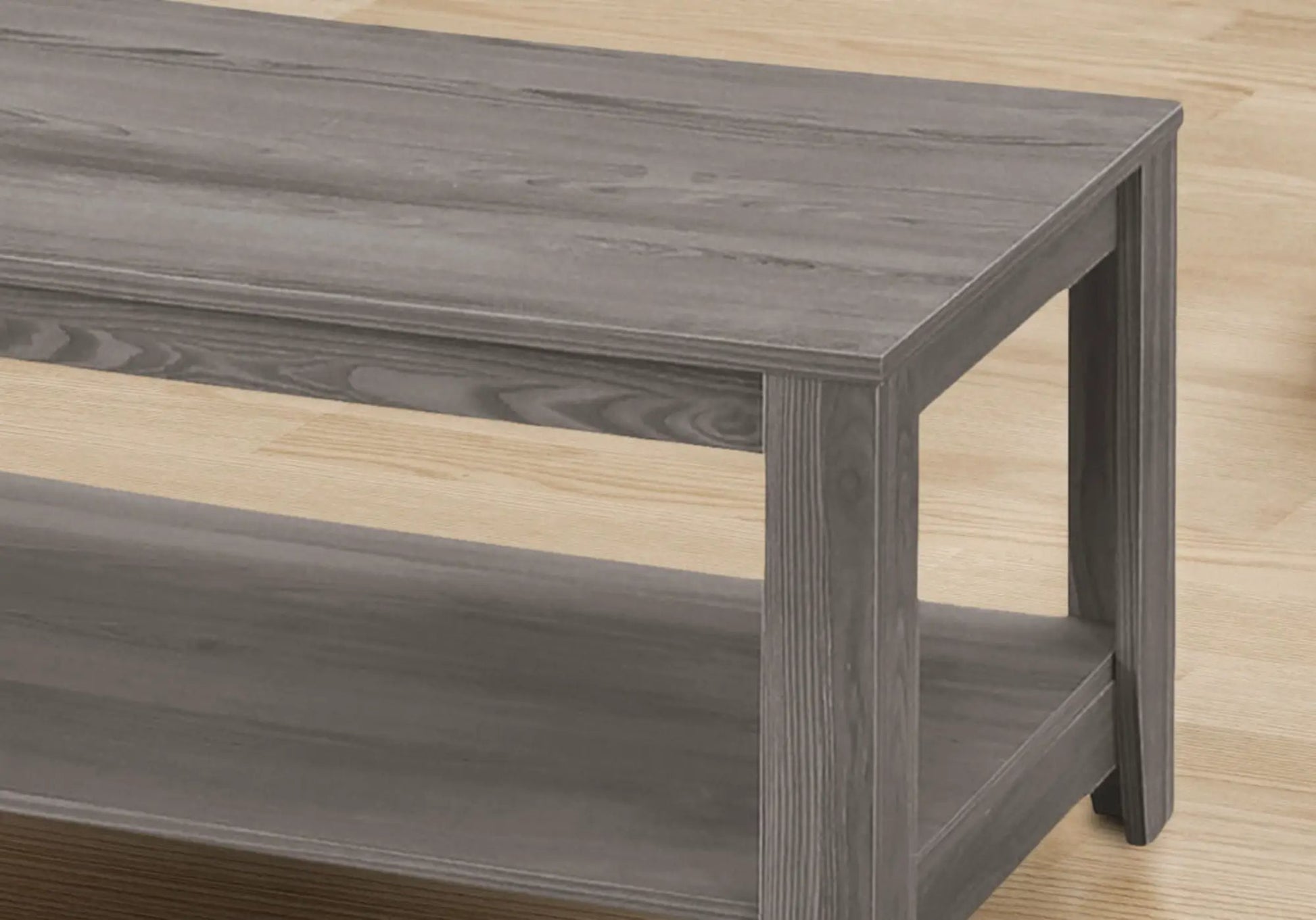 Gray wood coffee table with lower shelf and thick legs, part of a 3-piece table set on Tampa Home & Garden Store