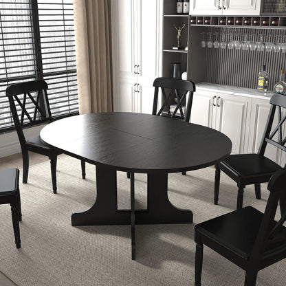 Black oval expandable dining table with removable leaf and X-shaped base; 4 chairs on Tampa Home & Garden Store