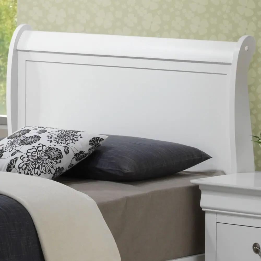 Upholstered Panel Sleigh Bed storage bed in white with curved headboard and beige bedding on Tampa Home & Garden Store