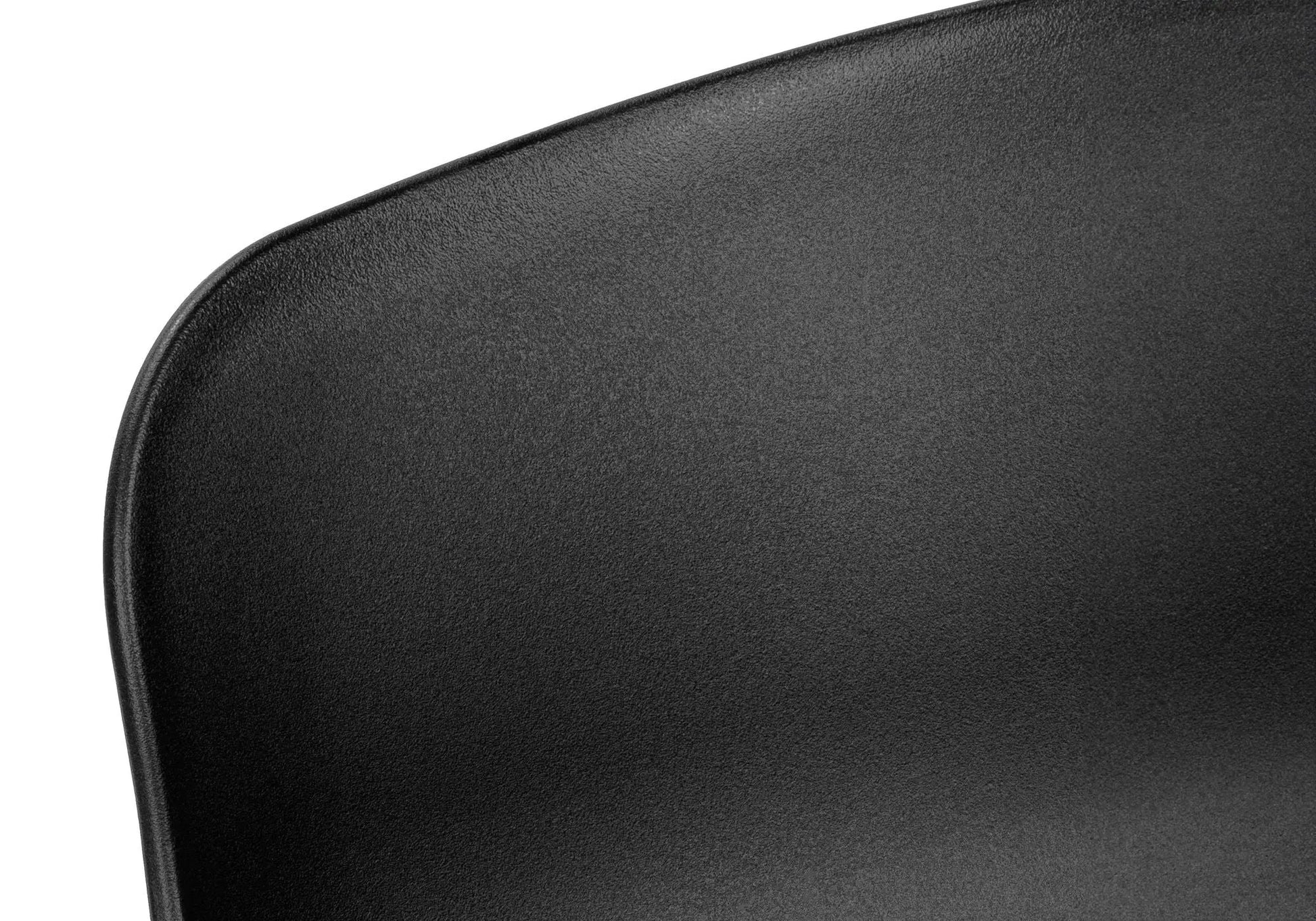 Office chair seat close-up in black textured faux leather with a curved edge on Tampa Home & Garden Store