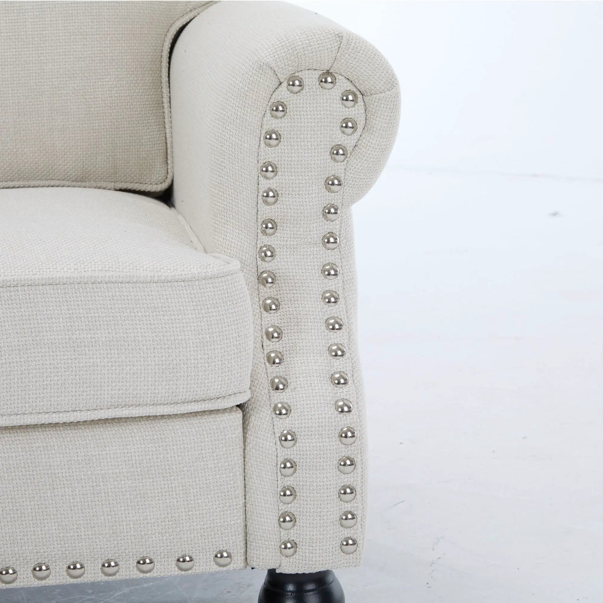 Rolled arm sofa with nailhead trim in beige fabric and wooden legs, Unique Piece Furniture on Tampa Home & Garden Store