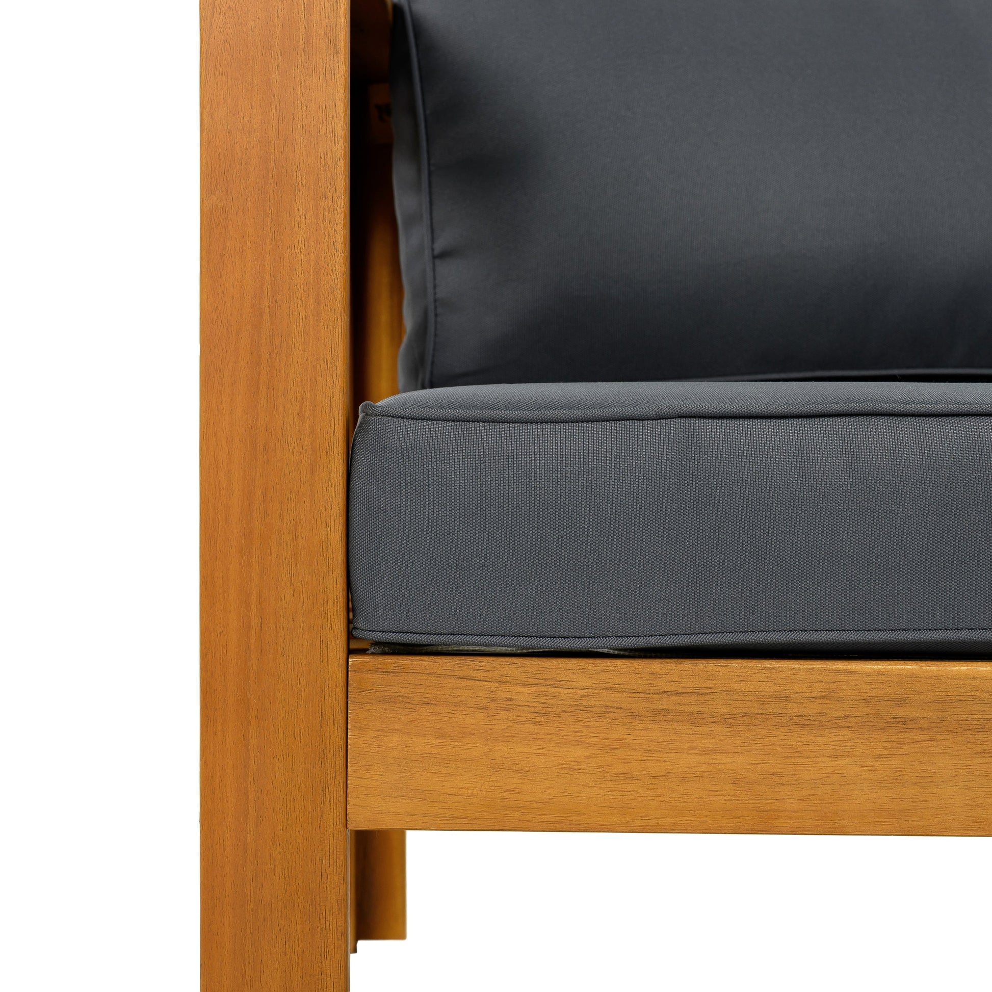 Outdoor club chair with warm acacia wood frame and dark gray cushion on Tampa Home & Garden Store
