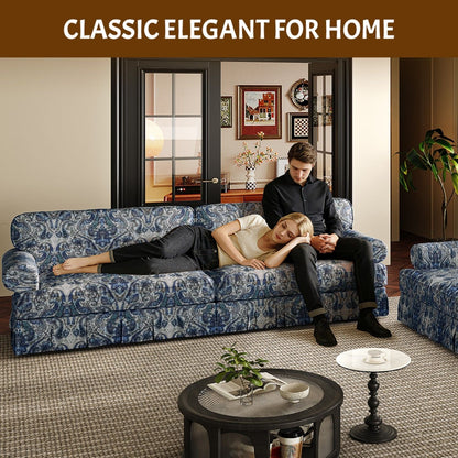 Comfortable Cloud Sofa with Rolled Arms and Skirt in blue patterned fabric with an ottoman on Tampa Home & Garden Store