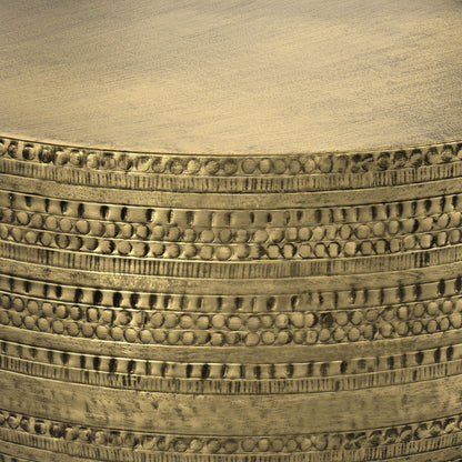 Handcrafted metal coffee table edge with hammered circular texture in bronze finish on Tampa Home & Garden Store