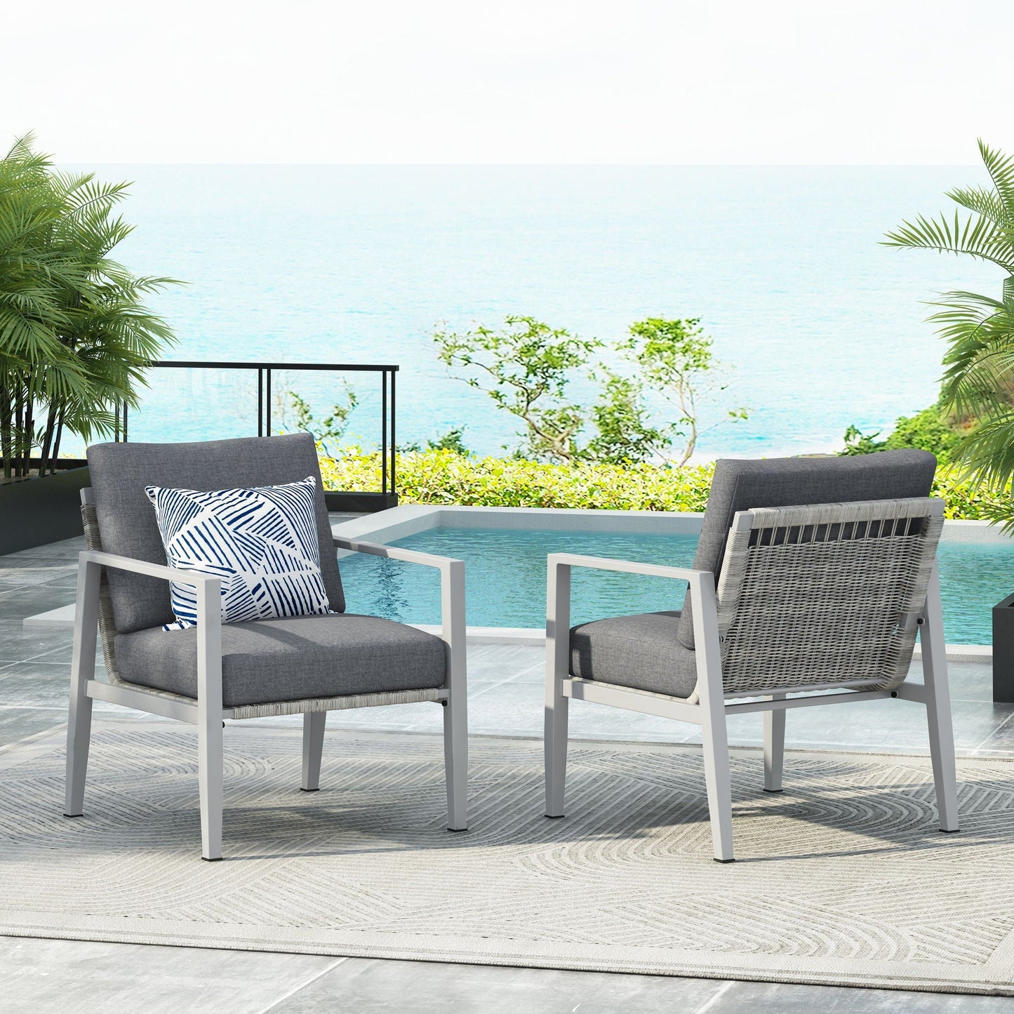 Two modern lounge chairs with rope accents and gray cushions by HouseOfZazla on Tampa Home & Garden Store
