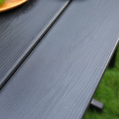 HDPE outdoor terrace dining chair set of 2 in black, close-up of textured slats on deck on Tampa Home & Garden Store