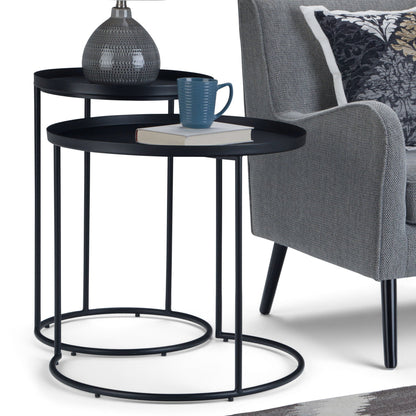 Monet Black Metal Nesting Tables by HouseOfZazla; two round black tables with blue mug on Tampa Home & Garden Store