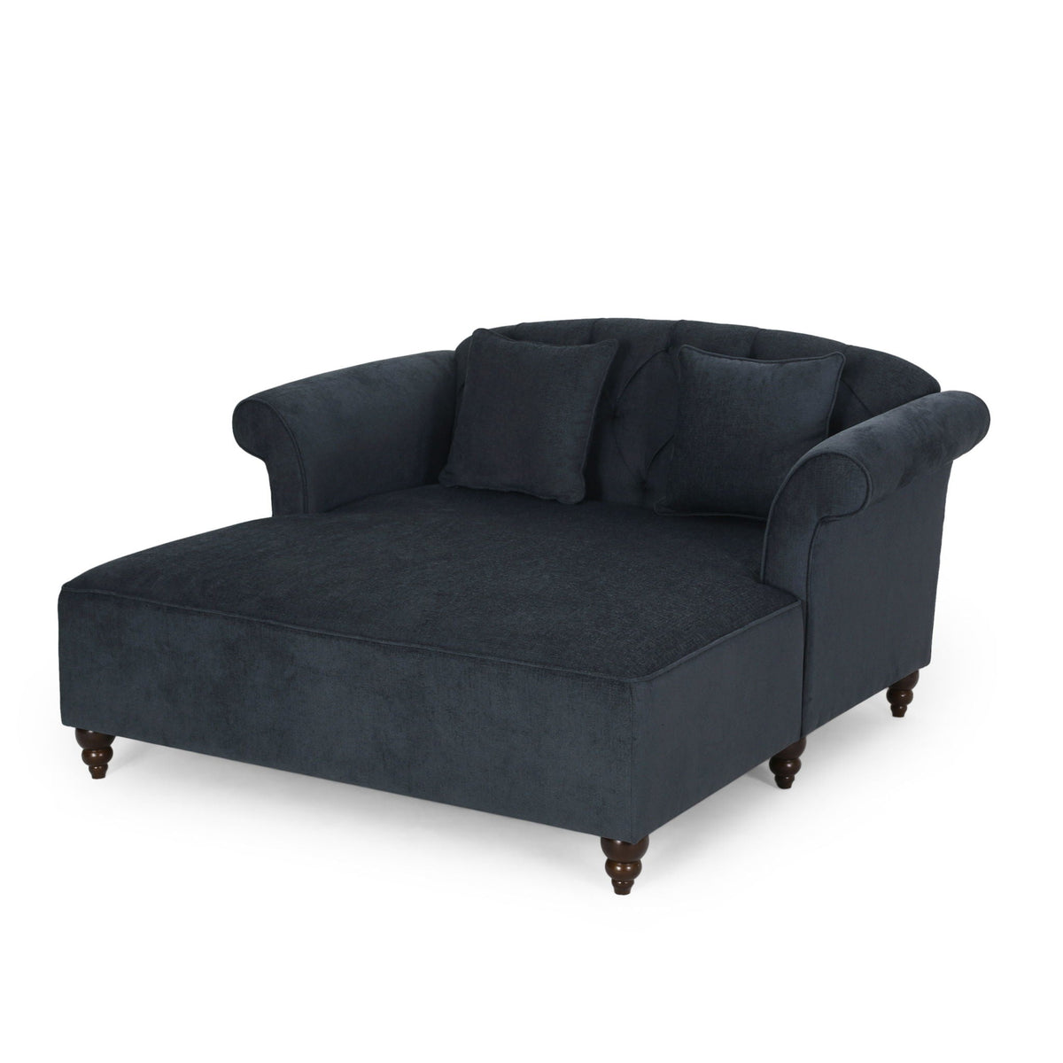 Elegant upholstered chaise in dark navy with gray pillows and turned wooden feet on Tampa Home & Garden Store