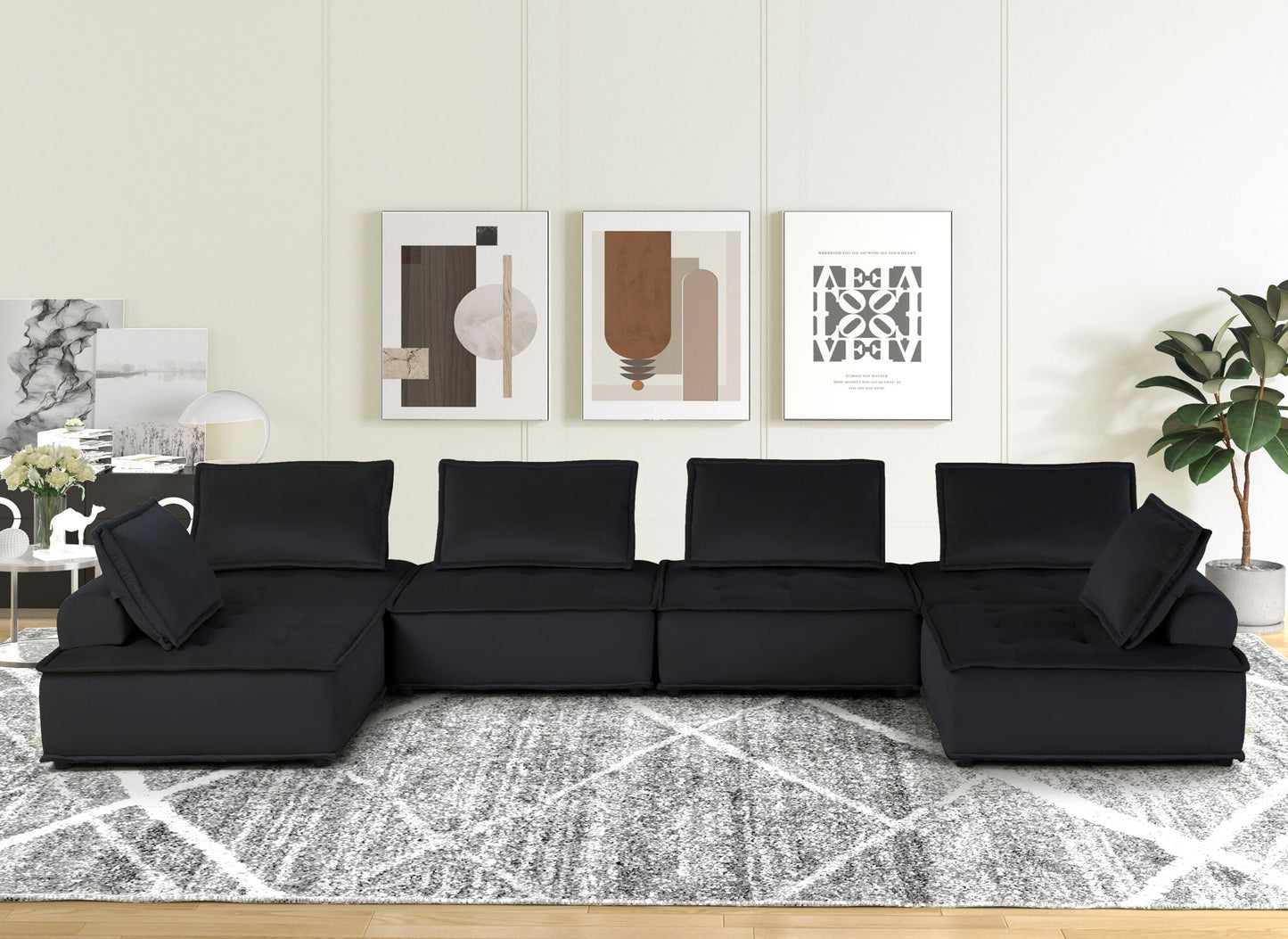 Anna - Stylish Sectional Sofa Ottoman in black upholstery, modern living room with abstract art on Tampa Home & Garden Store