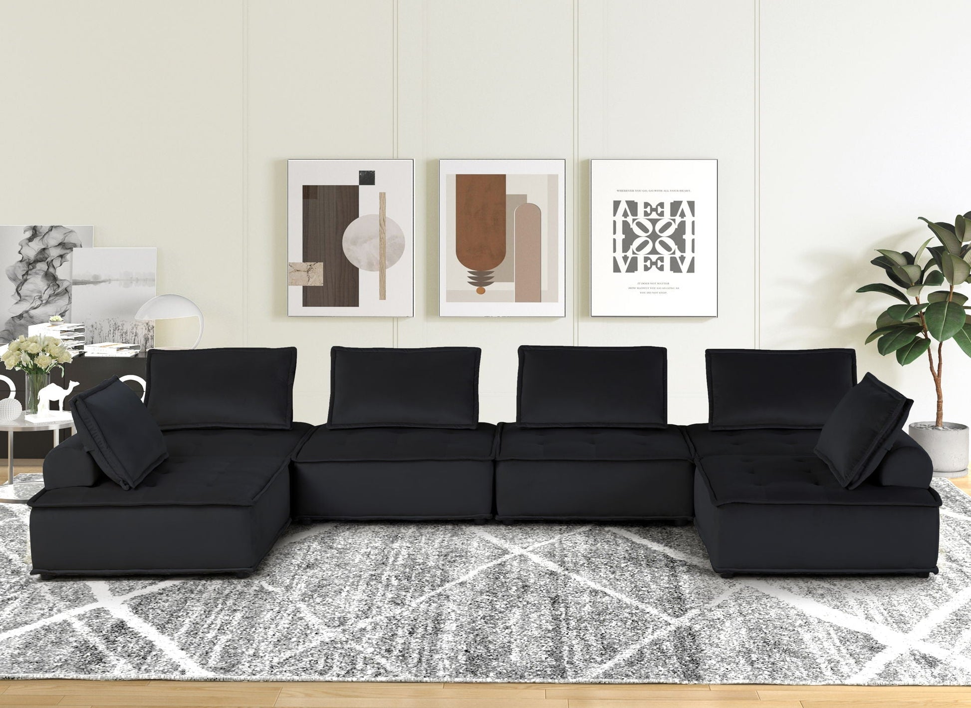 Anna - Stylish Sectional Sofa Ottoman in black upholstery, modern living room with abstract art on Tampa Home & Garden Store